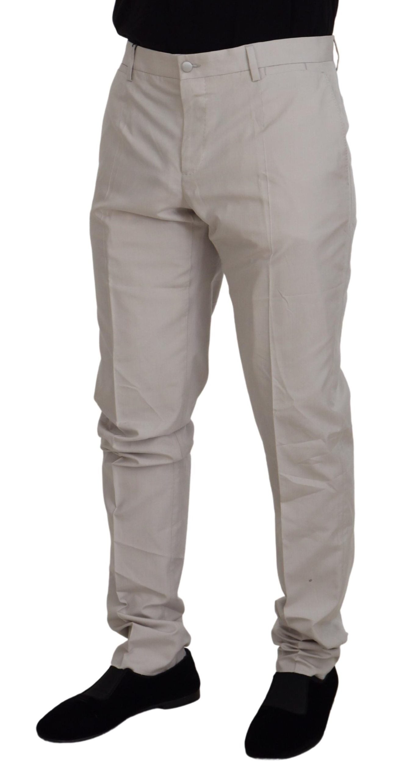 Dolce & Gabbana off-white silk mid-waist chino pants with tailored fit and side pockets, styled on a model.
