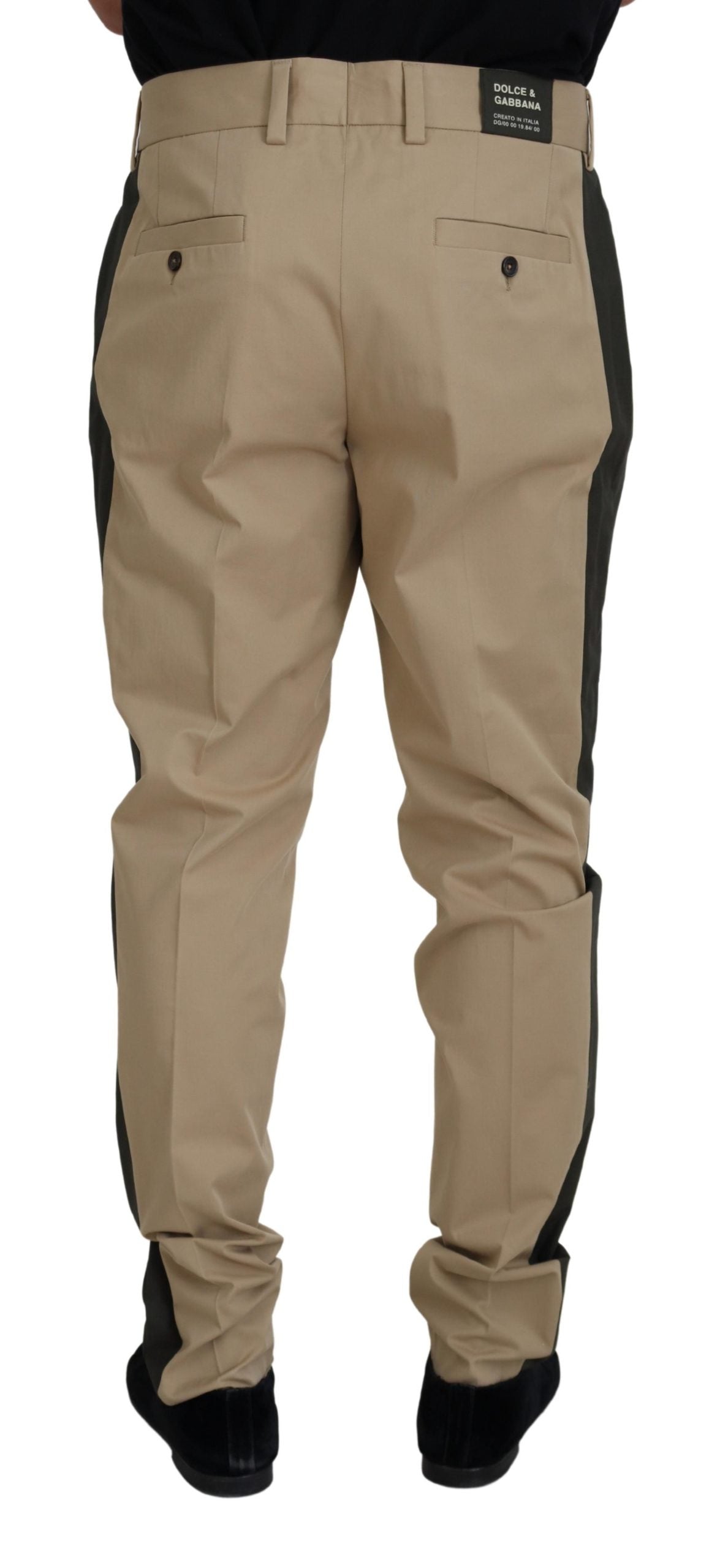 Brown and black cotton chino men's pants by Dolce & Gabbana, shown flat with a tailored fit and classic style.