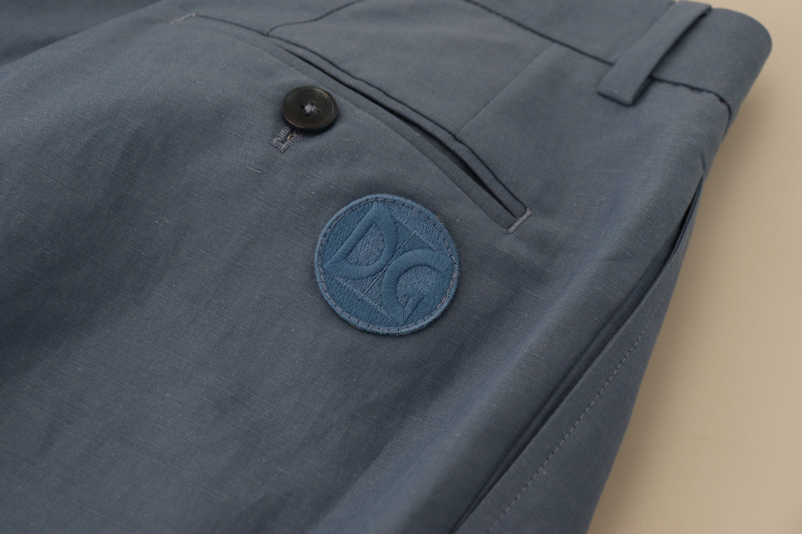 Blue linen chino formal pants by Dolce & Gabbana, tailored fit with crisp front creases and classic waistband.