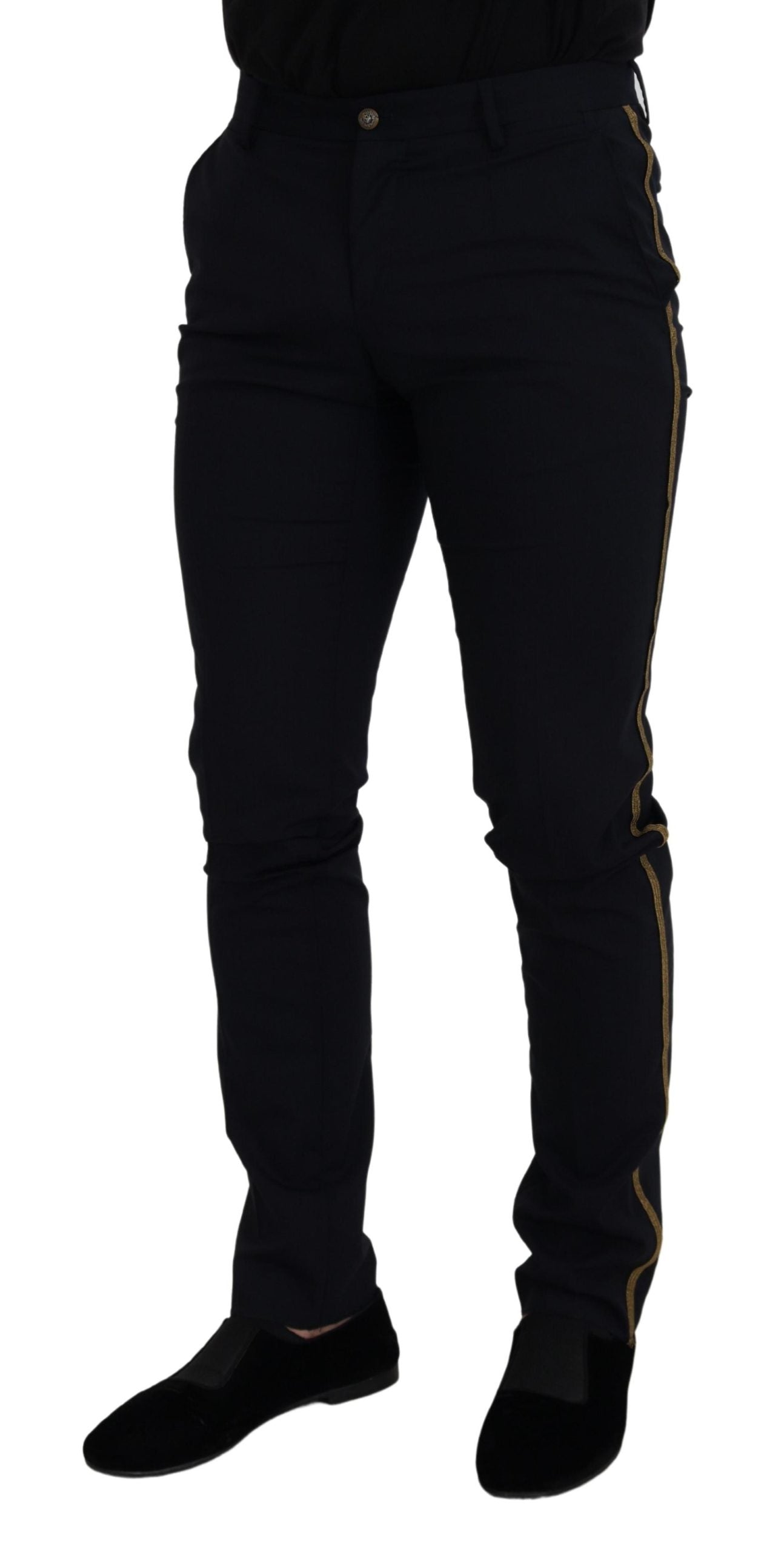 Black wool slim formal pants by Dolce & Gabbana, tailored fit with classic design, shown on a hanger against a plain background.