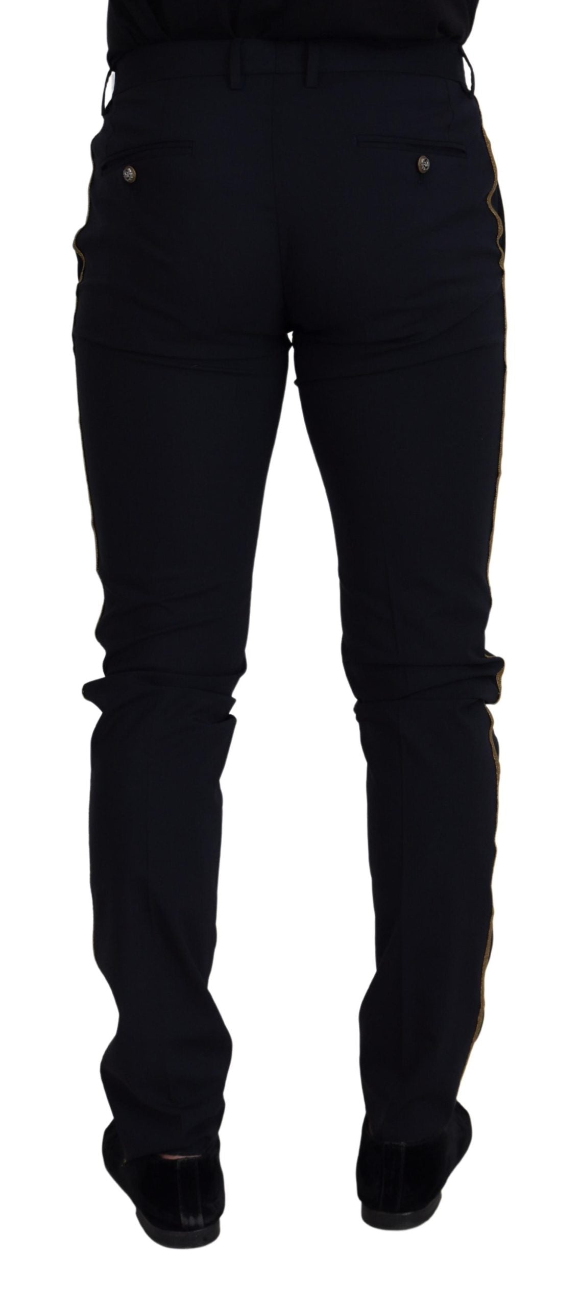 Black wool slim formal pants by Dolce & Gabbana, showing tailored fit and classic design on a neutral background.