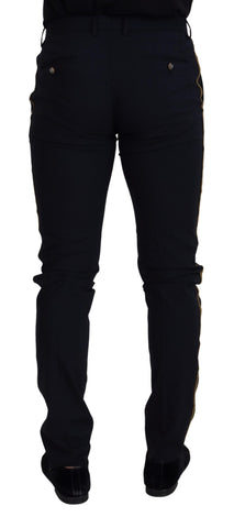Black wool slim formal pants by Dolce & Gabbana, showing tailored fit and classic design on a neutral background.