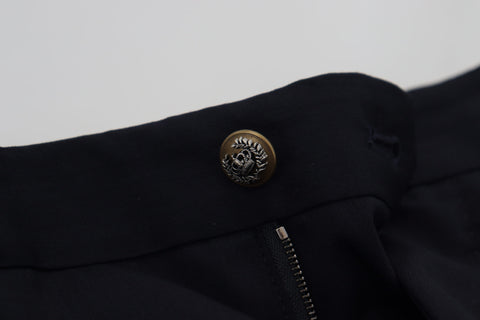 Black wool slim formal pants by Dolce & Gabbana, tailored fit with sleek design, shown on a hanger.