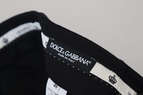 Black wool slim formal pants by Dolce & Gabbana, featuring tailored fit and classic design on a plain background.
