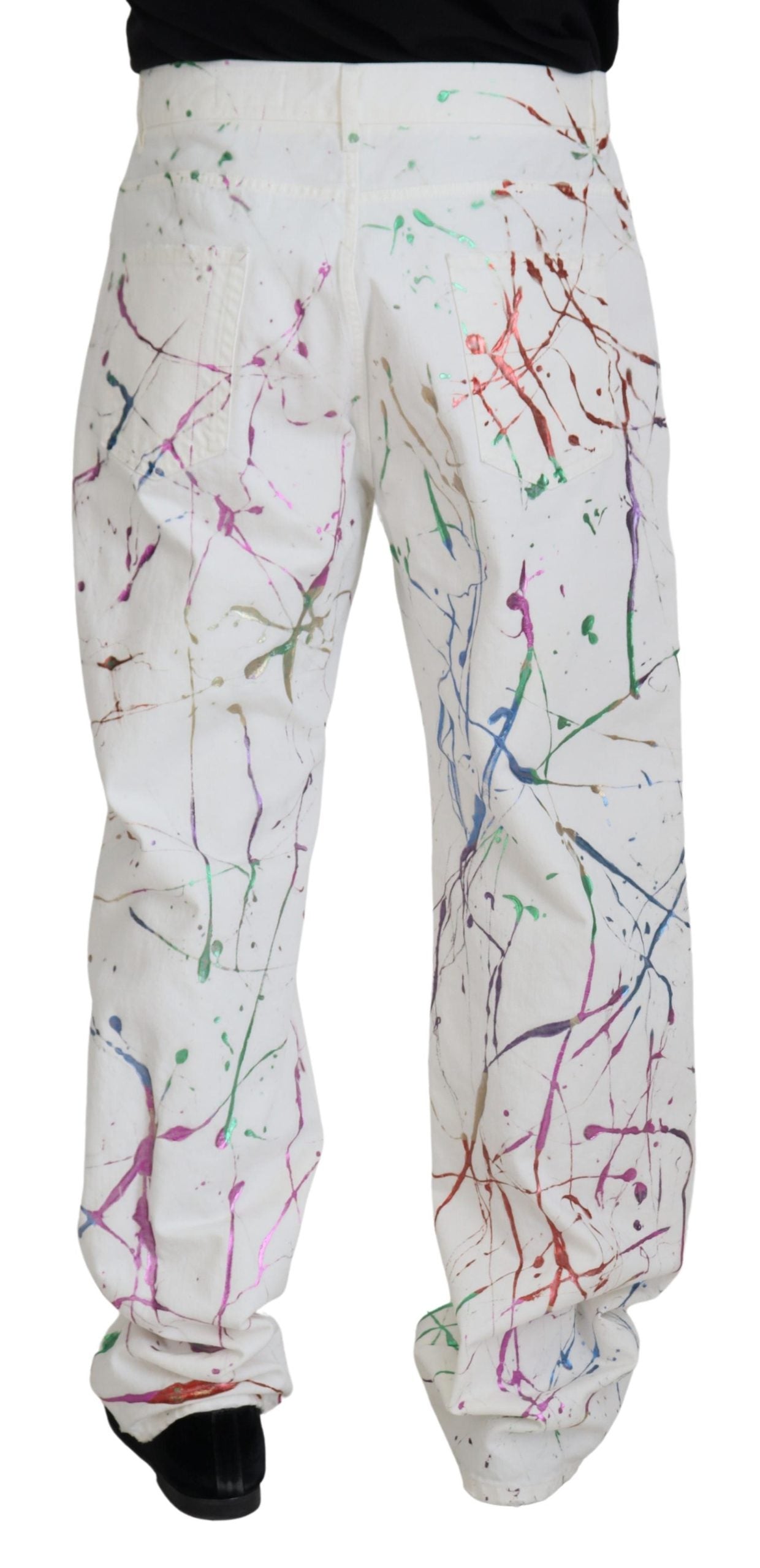 White cotton denim pants with colorful splash print by Dolce & Gabbana, showcasing a stylish, casual design.