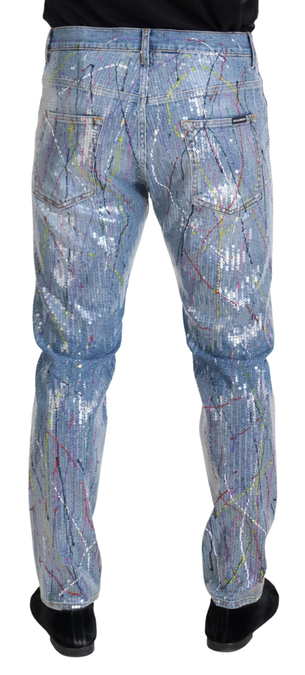 Blue cotton denim jeans with color splash print from Dolce & Gabbana, showcasing a stylish, casual fit.
