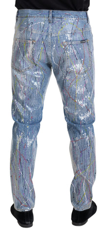 Blue cotton denim jeans with color splash print from Dolce & Gabbana, showcasing a stylish, casual fit.