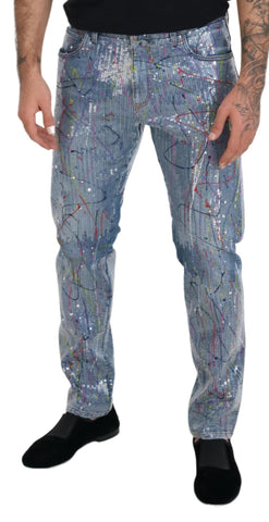 Blue cotton denim jeans with colorful splash print by Dolce & Gabbana, showcasing a stylish and trendy design.