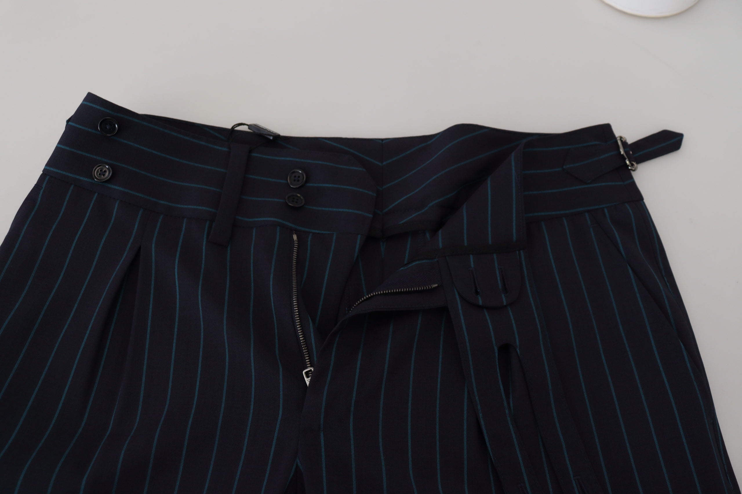 Blue striped men's formal pants by Dolce & Gabbana, tailored fit with classic waistband and stylish stripe pattern.