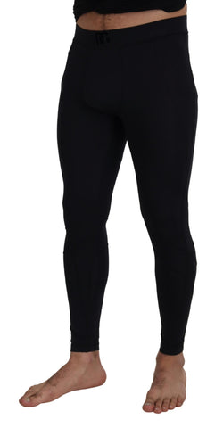 Black nylon slim fit stretch pants by Dolce & Gabbana, featuring a sleek tailored design and modern silhouette.