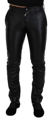 Black shiny stretch skinny pants by Dolce & Gabbana, close-up of sleek, fitted design and smooth fabric texture.
