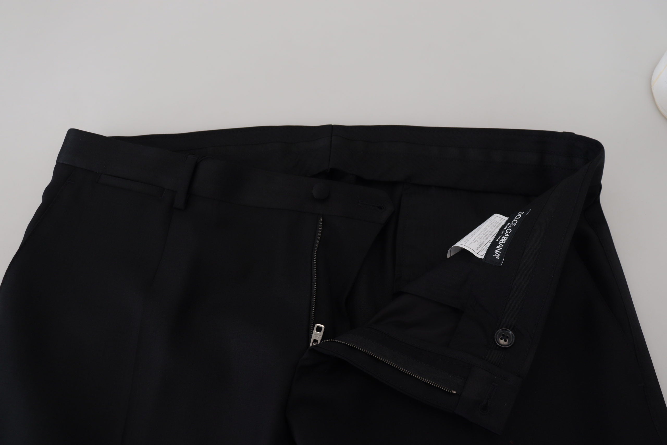 Black wool chino formal pants by Dolce & Gabbana, tailored fit with classic design and clean lines.