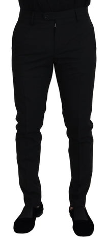 Black polyester chino formal pants by Dolce & Gabbana, tailored fit with classic design, shown on a hanger.