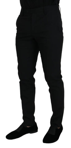 Black polyester chino formal pants by Dolce & Gabbana, tailored fit with classic design and belt loops.