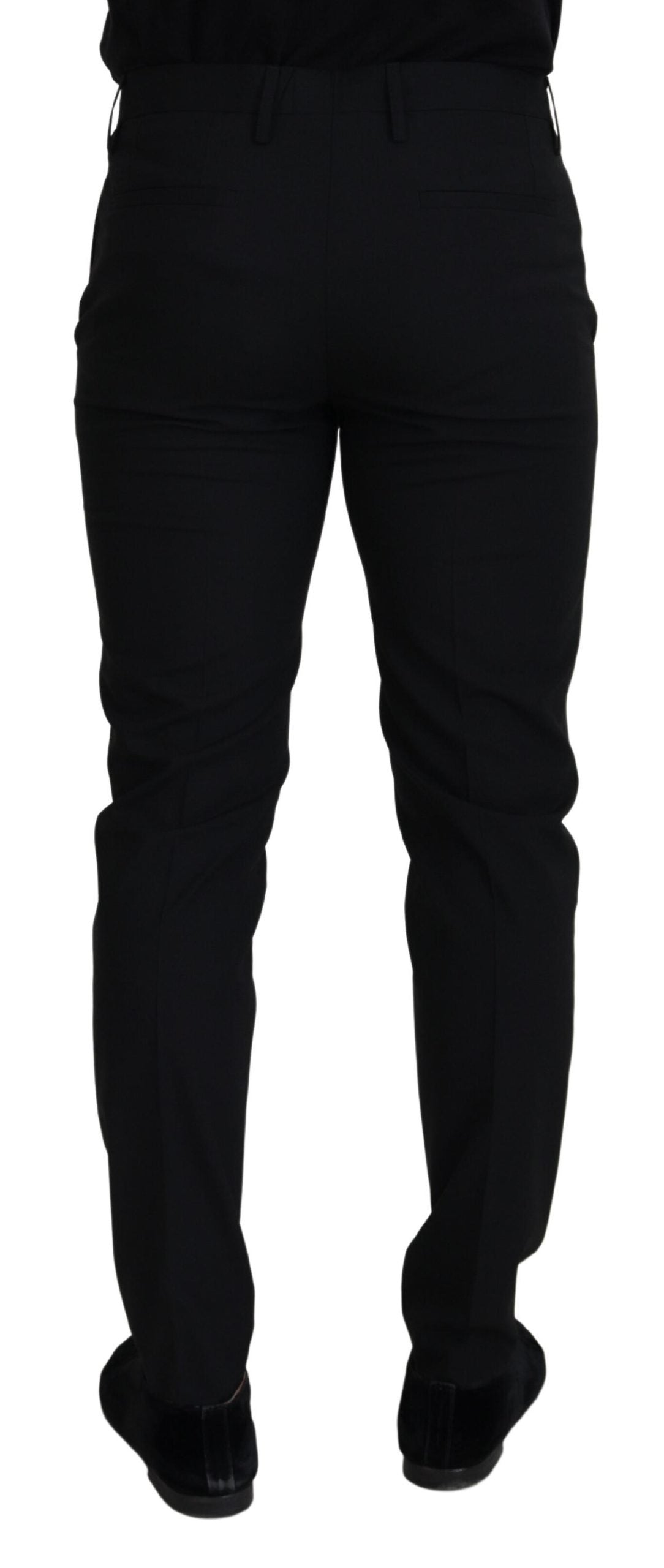 Black polyester chino formal pants by Dolce & Gabbana, tailored fit, front pockets, and sleek design for sophisticated style.