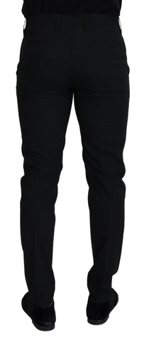 Black polyester chino formal pants by Dolce & Gabbana, tailored fit, front pockets, and sleek design for sophisticated style.