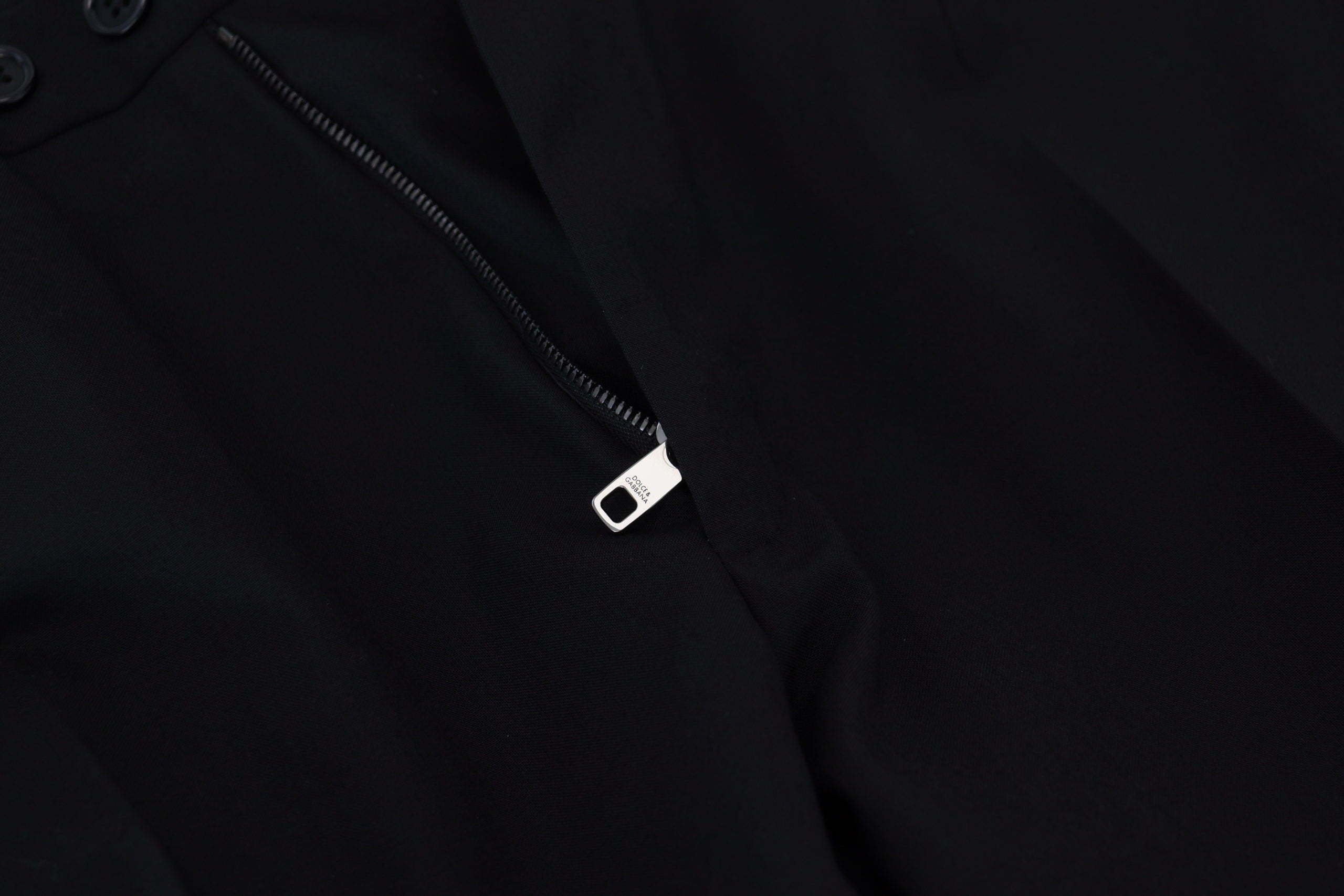 Black polyester chino formal pants by Dolce & Gabbana, tailored fit with classic design and clean lines.