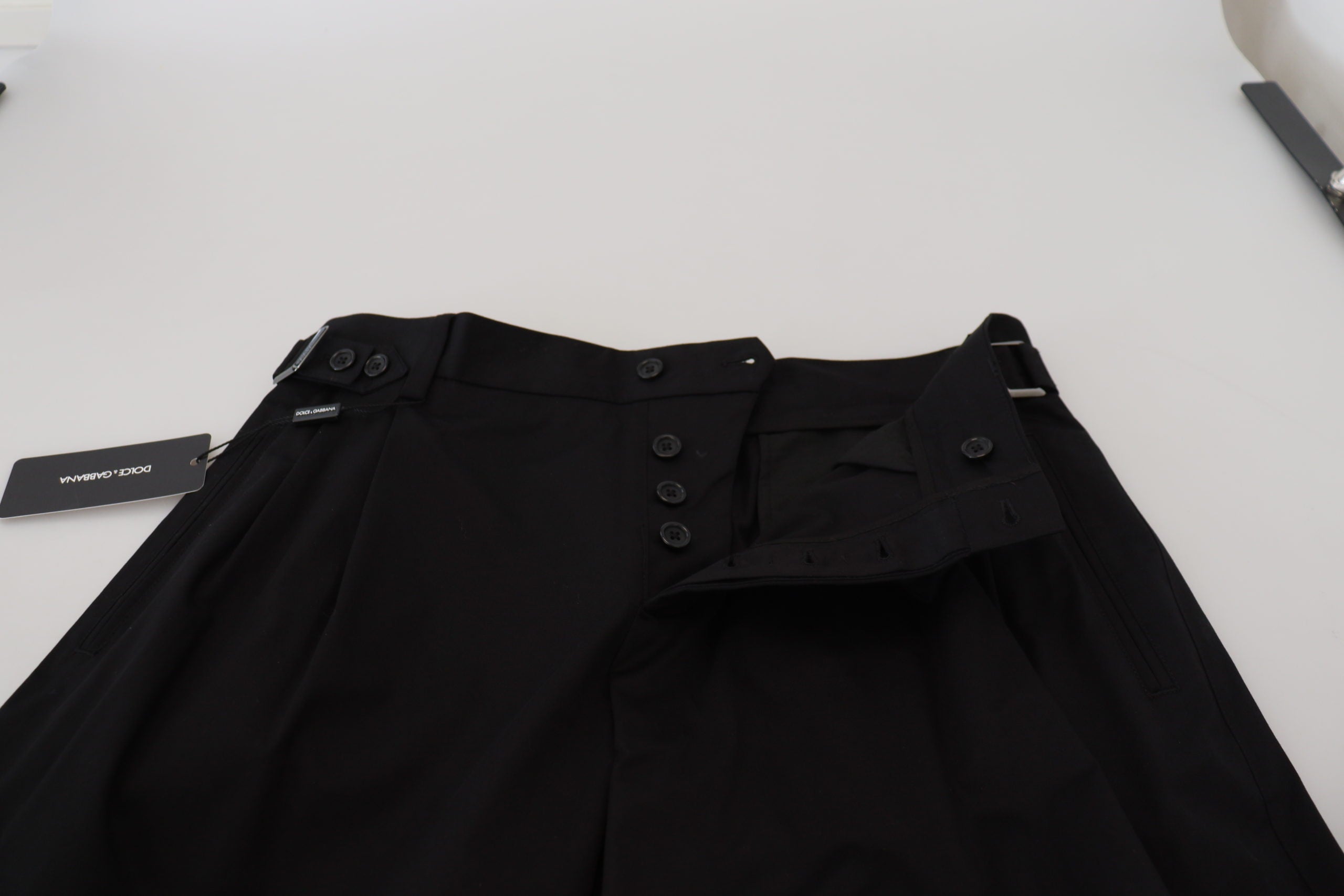 Black cotton chino formal pants by Dolce & Gabbana, tailored fit with classic design and belt loops, suitable for professional attire.