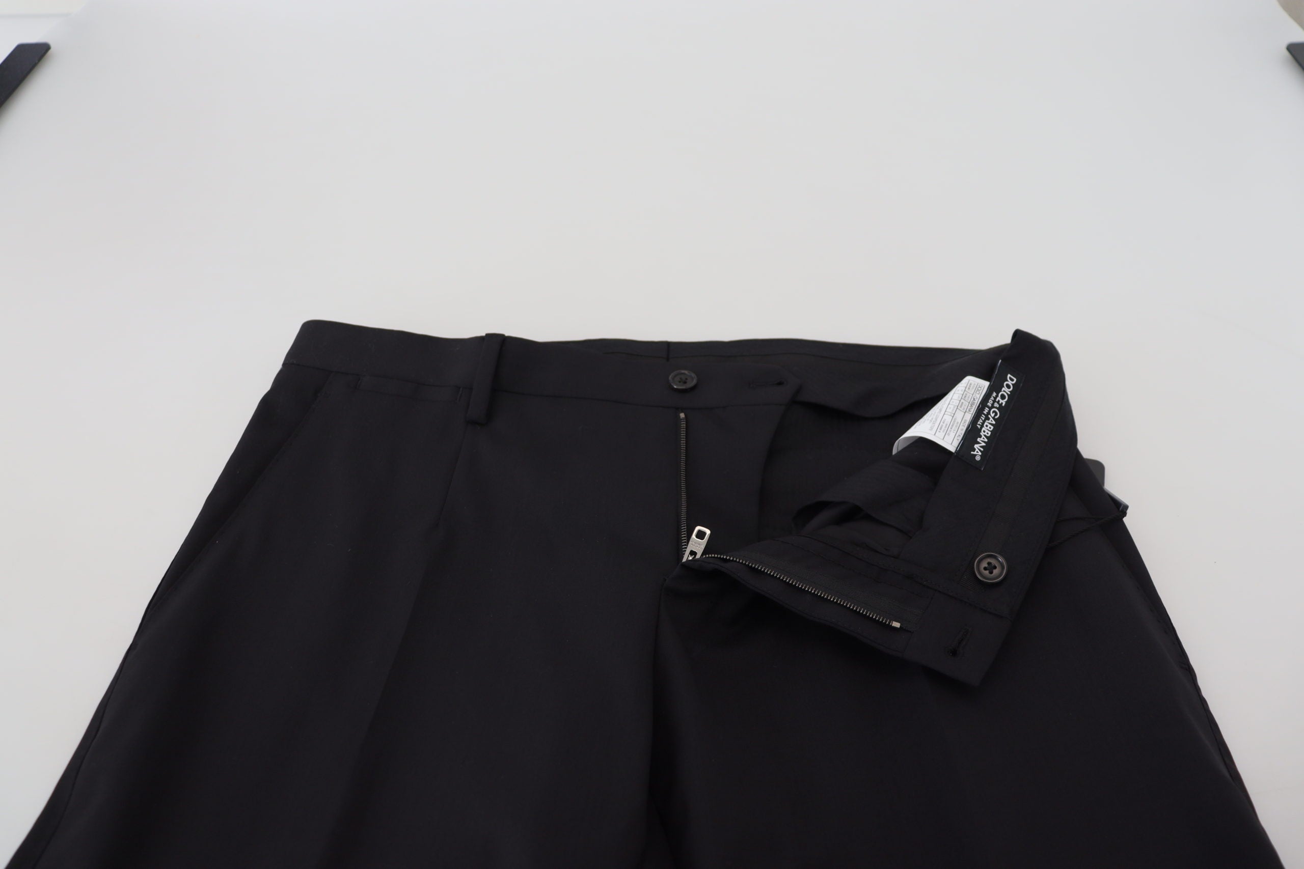 Black wool chino formal pants by Dolce & Gabbana, tailored fit with classic design and sleek finish.