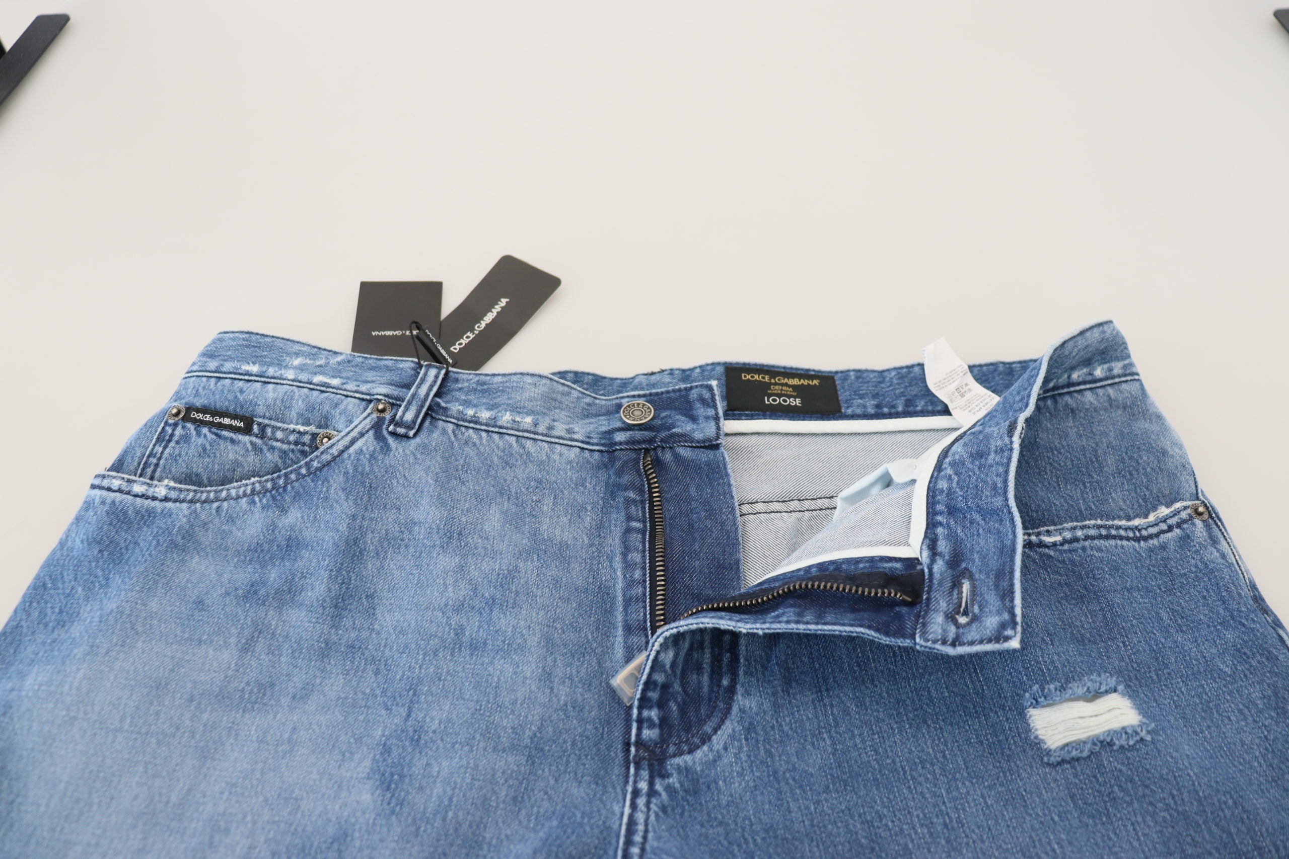 Blue washed cotton casual denim jeans by Dolce & Gabbana, showing a relaxed fit with classic five-pocket style.