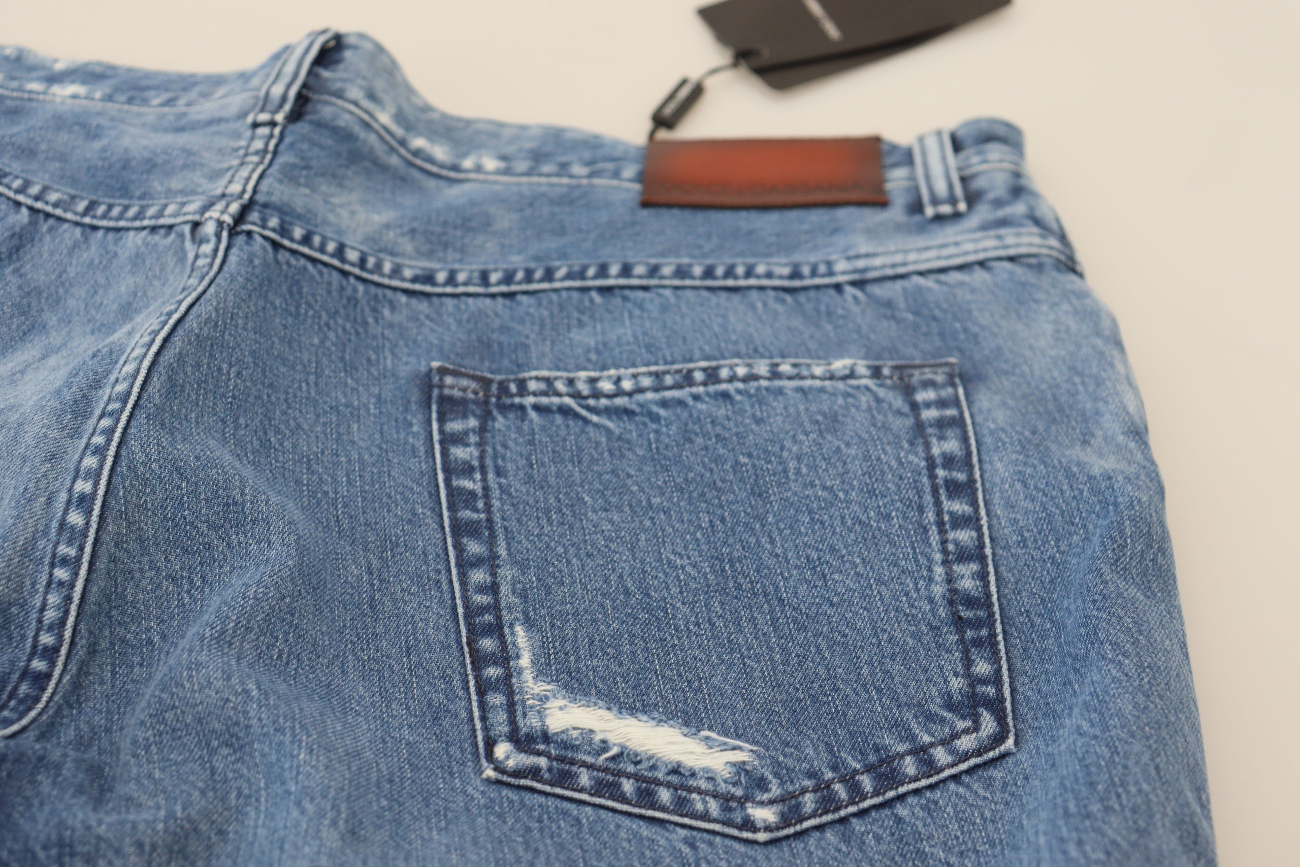 Blue washed cotton casual denim jeans by Dolce & Gabbana, featuring a relaxed fit and classic five-pocket design.