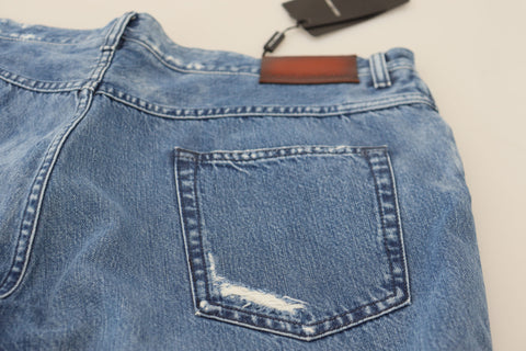 Blue washed cotton casual denim jeans by Dolce & Gabbana, featuring a relaxed fit and classic five-pocket design.