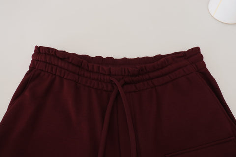 Maroon Bermuda cargo shorts for men by Dolce & Gabbana, featuring multiple pockets and a relaxed fit.