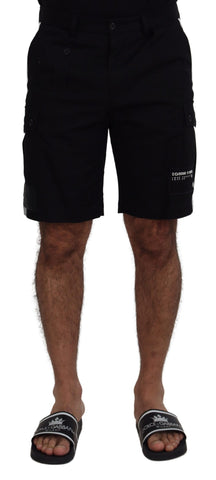 Black Bermuda cargo shorts by Dolce & Gabbana with multiple pockets and casual fit, displayed on a clothing hanger.