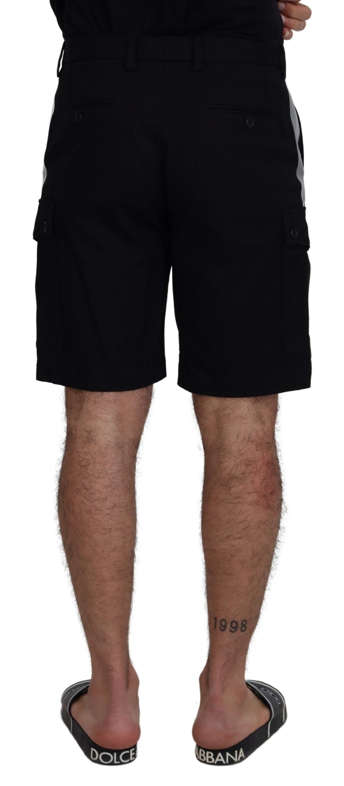 Black Bermuda cargo shorts by Dolce & Gabbana, casual men's shorts with multiple pockets and relaxed fit.