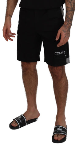 Black Bermuda cargo casual shorts by Dolce & Gabbana, featuring a relaxed fit and multiple side pockets.