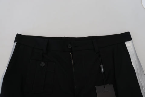 Black Bermuda cargo casual shorts by Dolce & Gabbana, featuring a relaxed fit with multiple pockets and a stylish, versatile design.