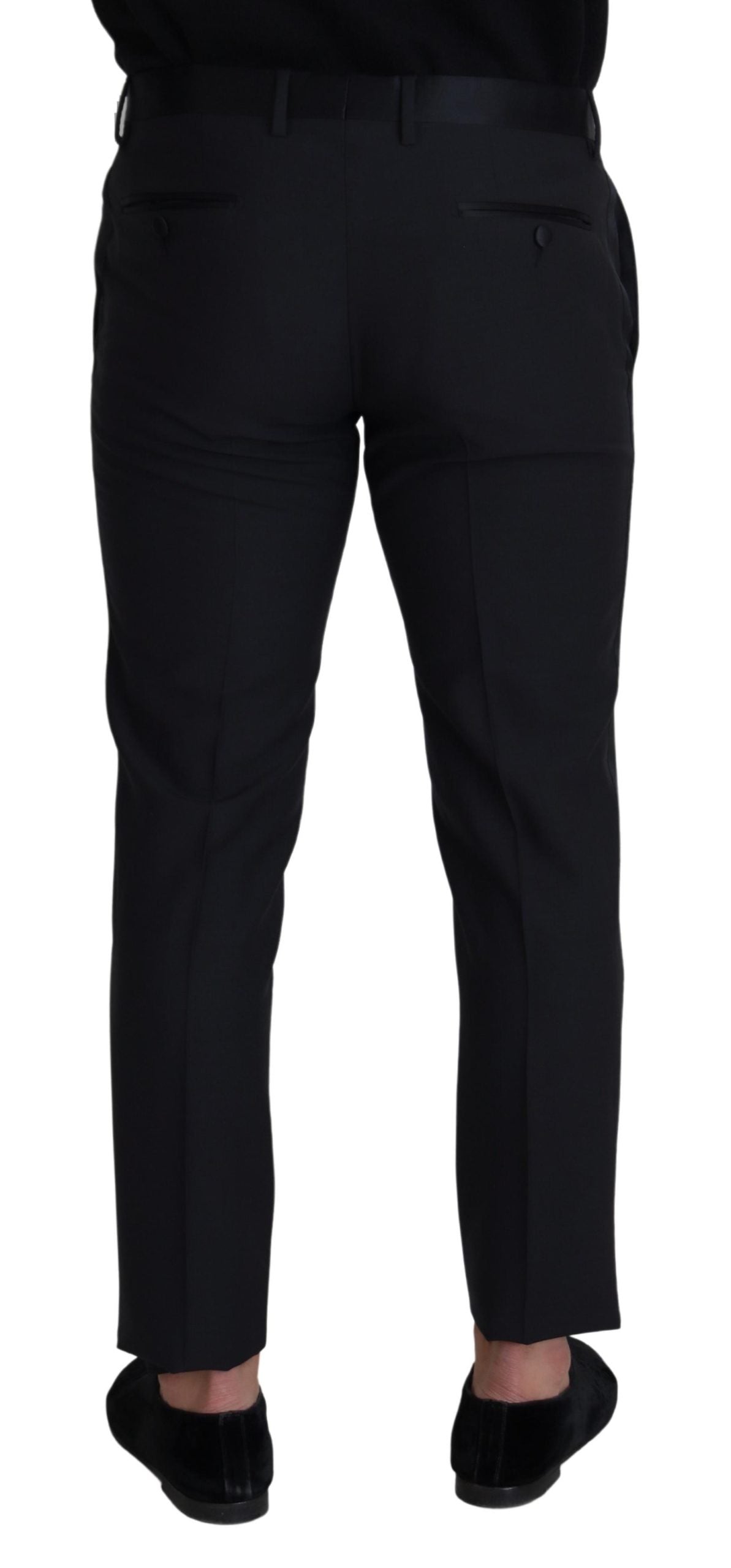Black wool men's formal pants by Dolce & Gabbana, tailored fit with front and back pockets, on a plain background.