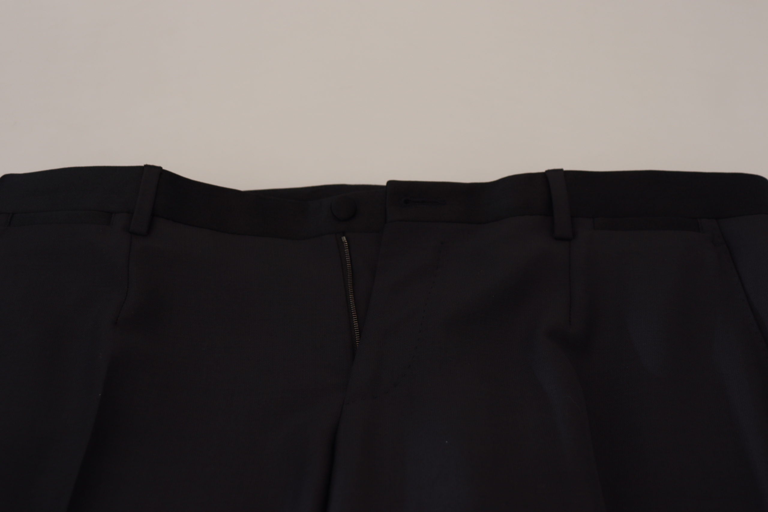 Black wool men's formal pants by Dolce & Gabbana, tailored fit with classic waistband and sleek design.