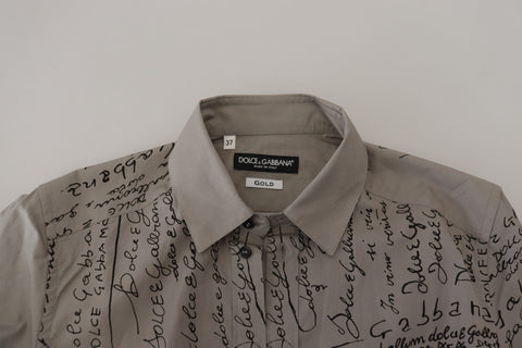 Gray printed cotton slim dress by Dolce & Gabbana featuring a gold shirt-style design and tailored fit.