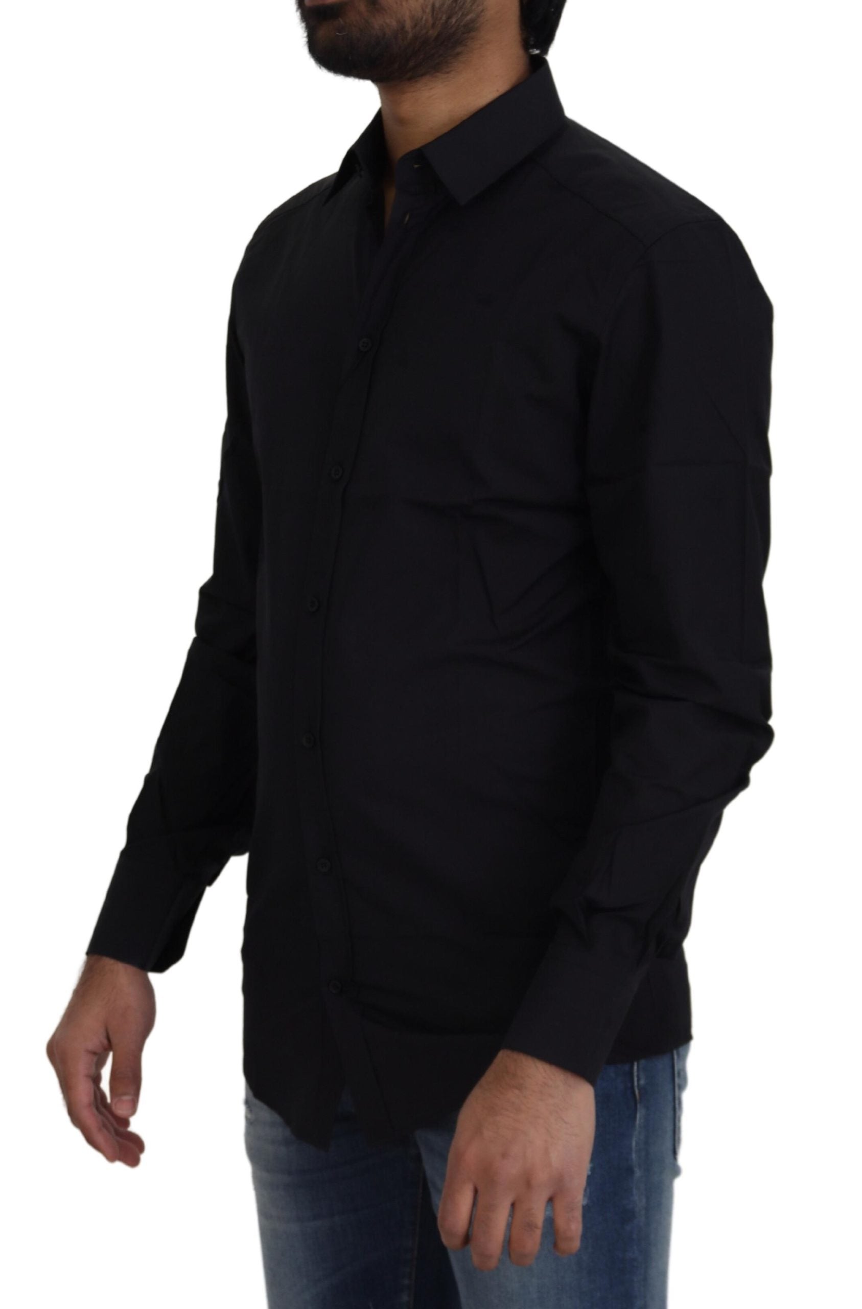 Black cotton slim fit formal dress shirt by Dolce & Gabbana with gold accents, shown on a hanger.