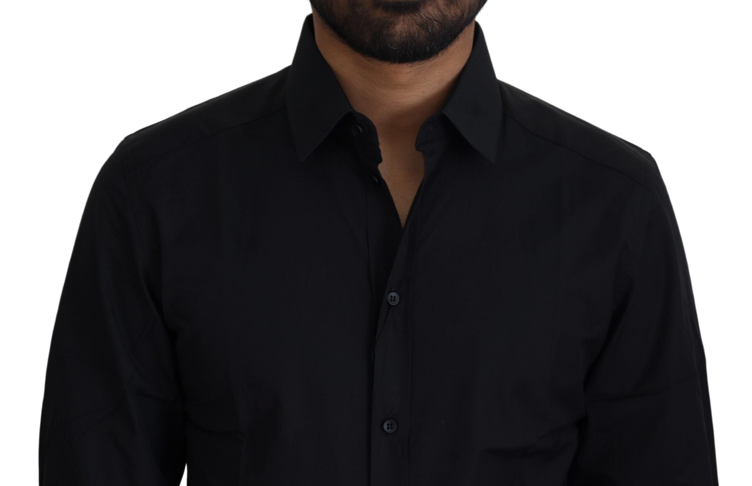 Black cotton slim fit formal dress shirt by Dolce & Gabbana with gold accents, displayed on a hanger.