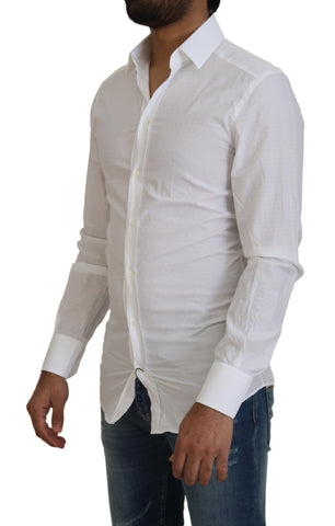 White cotton slim fit formal dress shirt by Dolce & Gabbana with gold accents, shown on a hanger against a plain background.