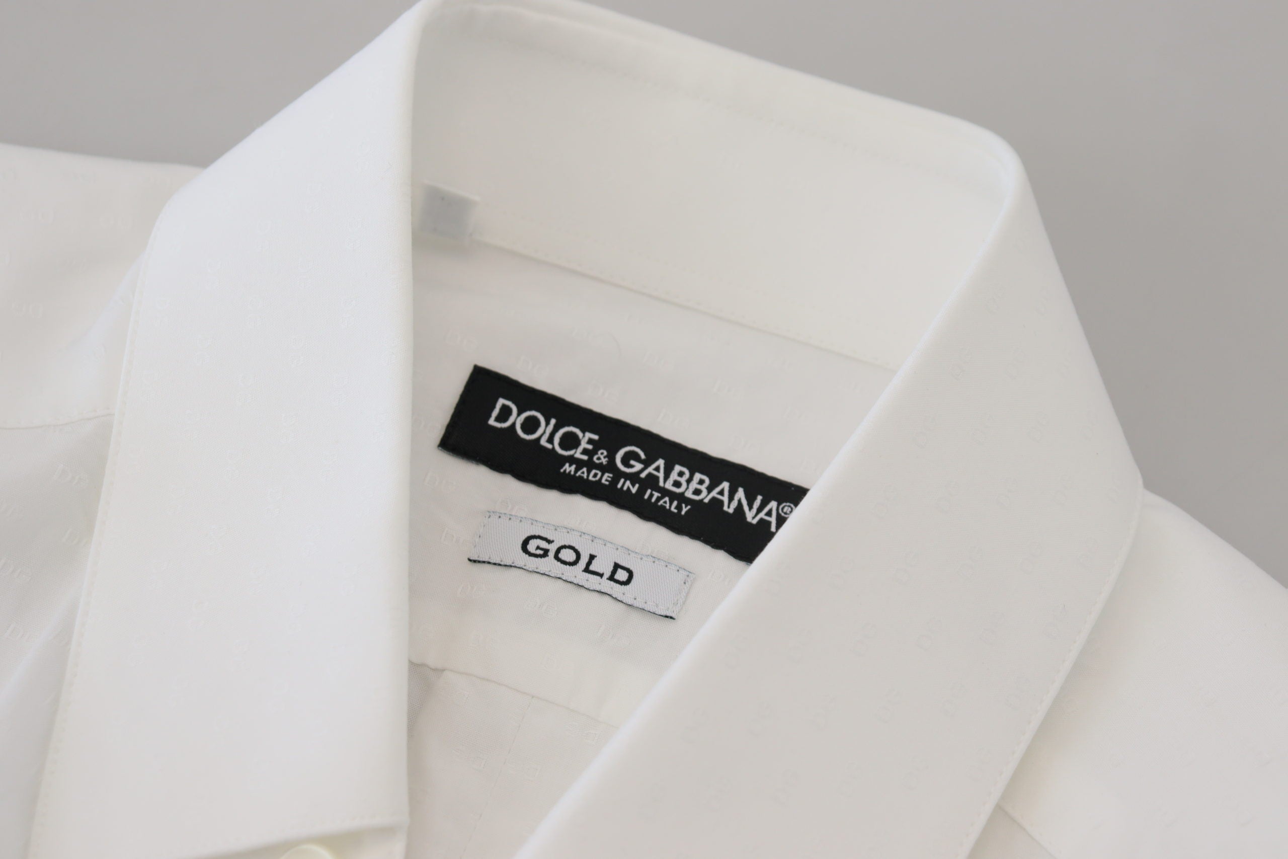 White cotton slim fit formal dress shirt by Dolce & Gabbana, featuring a gold-tone collar and button details.