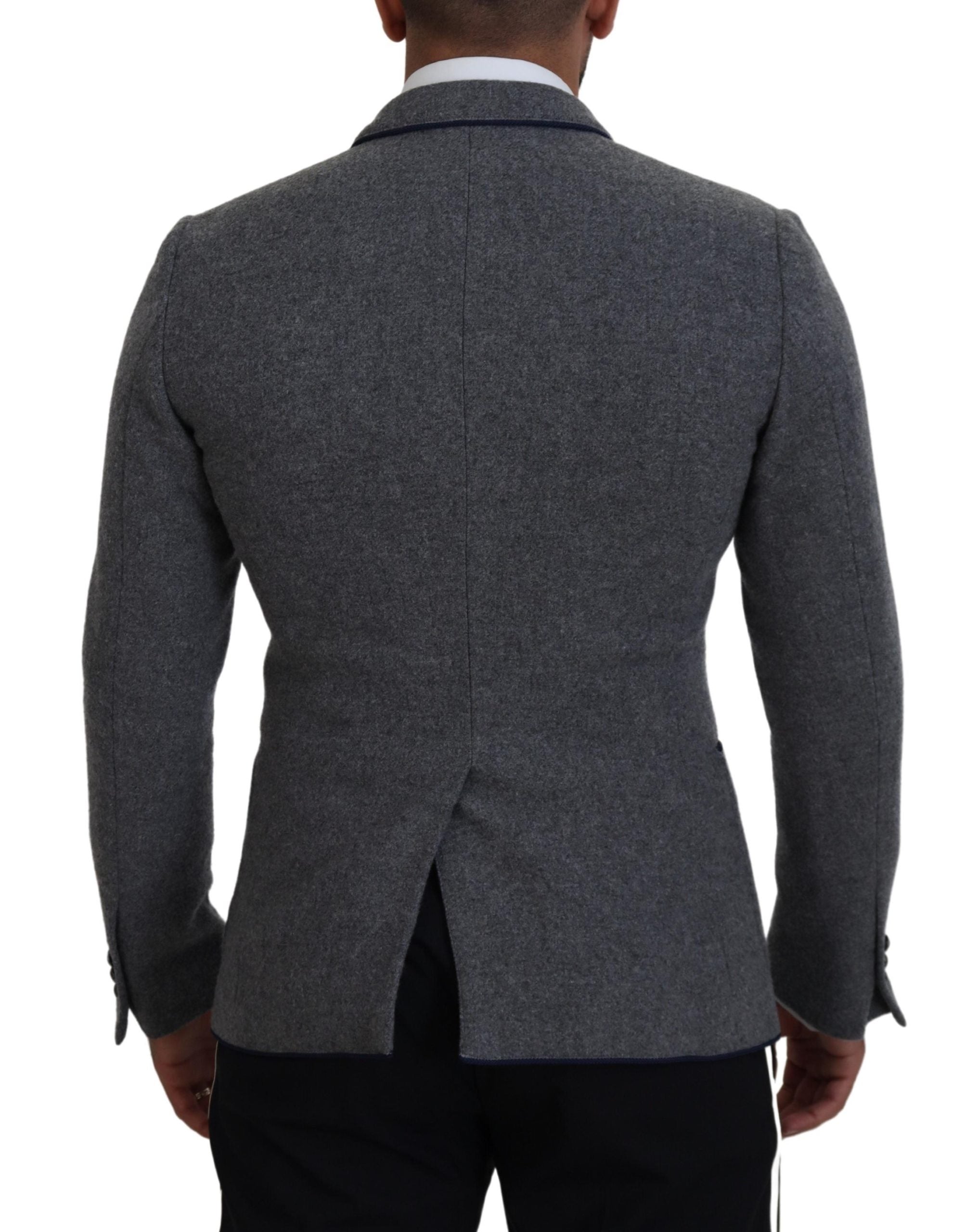 Gray wool blazer with rose embellishments, slim fit jacket by Dolce & Gabbana, shown on a model.