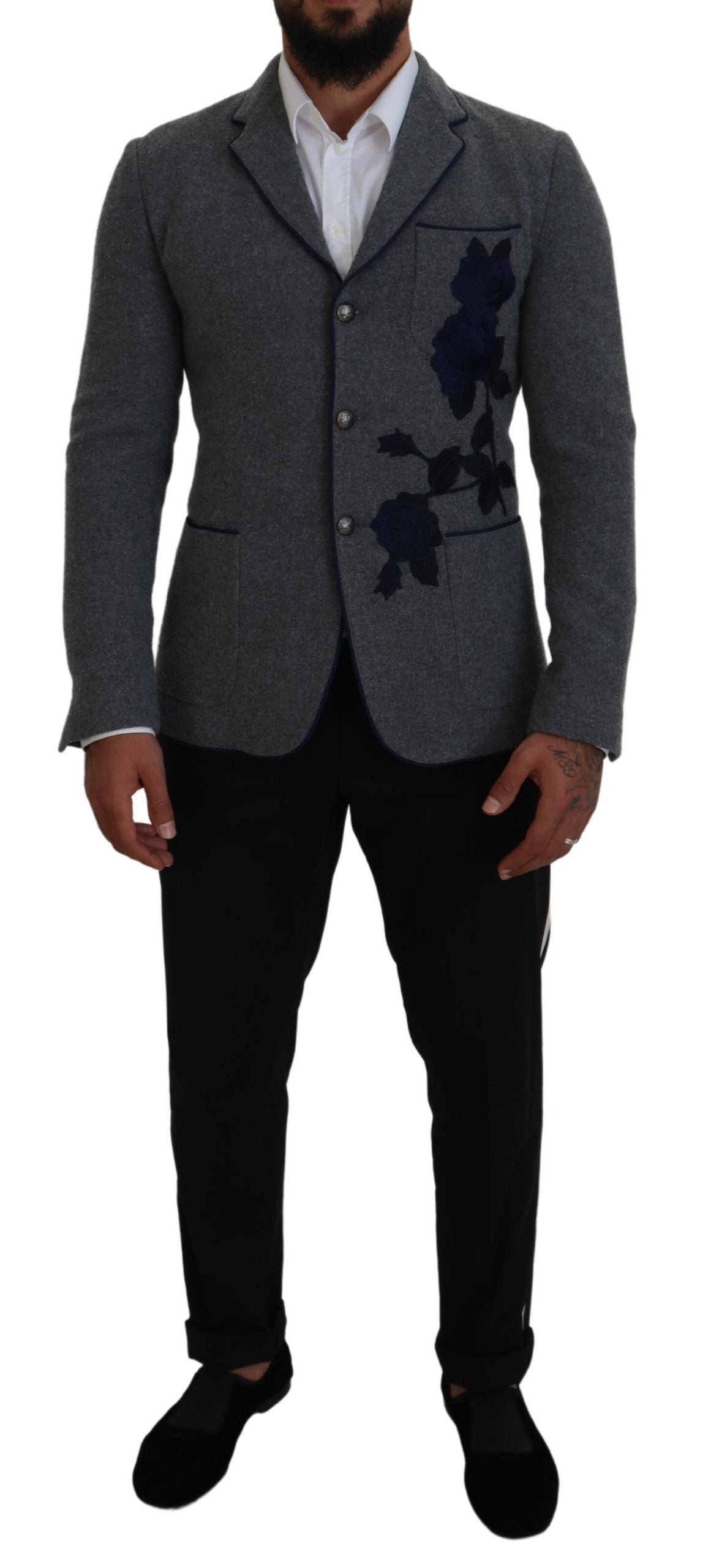 Gray wool blazer with rose embroidery, slim fit jacket by Dolce & Gabbana, shown on a hanger against a neutral background.