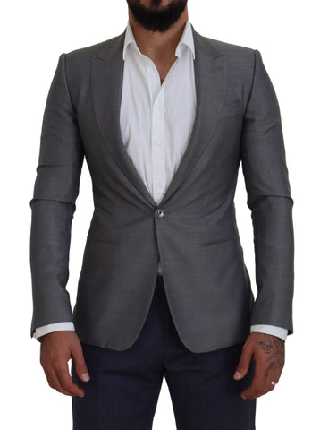 Gray wool silk slim fit blazer by Dolce & Gabbana, tailored jacket with notch lapel and single-breasted design.