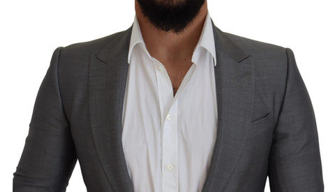 Gray wool and silk slim fit blazer jacket by Dolce & Gabbana, featuring a tailored design and classic lapel collar.