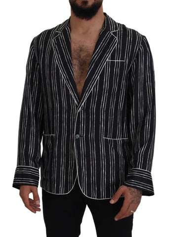 Blue striped silk pajama shirt jacket by Dolce & Gabbana with a relaxed fit and button-front design.