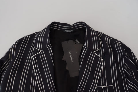 Blue striped silk pajama shirt jacket from Dolce & Gabbana, featuring a relaxed fit and elegant design, displayed on a hanger.