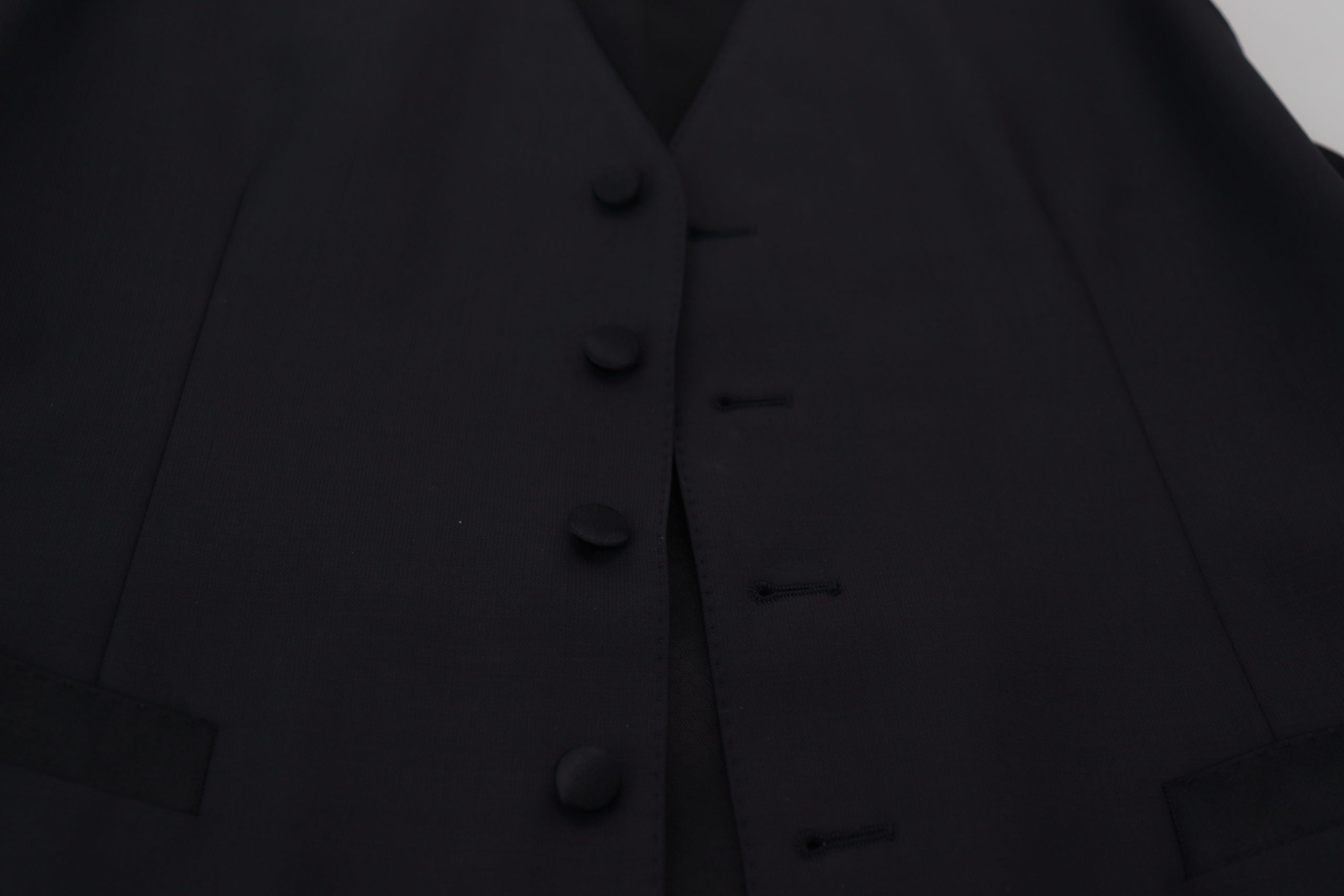 Black wool stretch waistcoat formal vest by Dolce & Gabbana, featuring tailored fit and classic design.