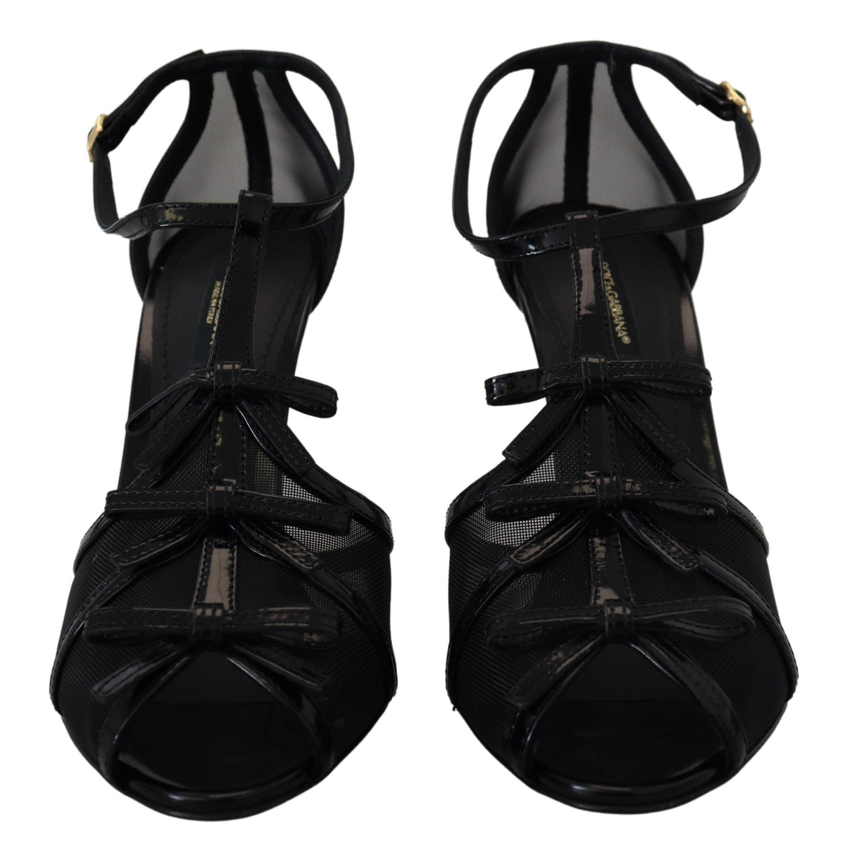 Black stiletto high heel sandals by Dolce & Gabbana with sleek straps and pointed toe, stylish footwear for formal occasions.