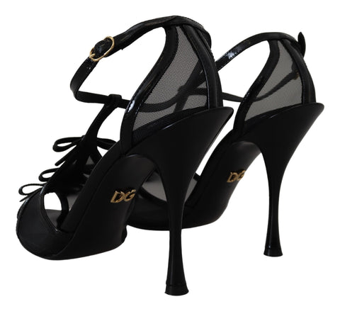 Black Dolce & Gabbana stiletto high heels sandals with sleek straps and pointed toes, stylish for elegant occasions.
