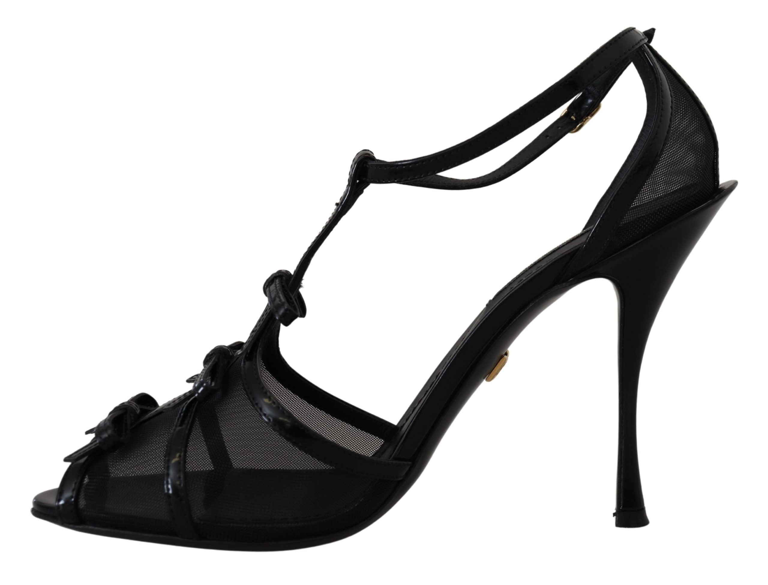 Black Dolce & Gabbana stiletto high heels sandals with sleek straps and pointed toes, stylishly designed for elegant footwear.