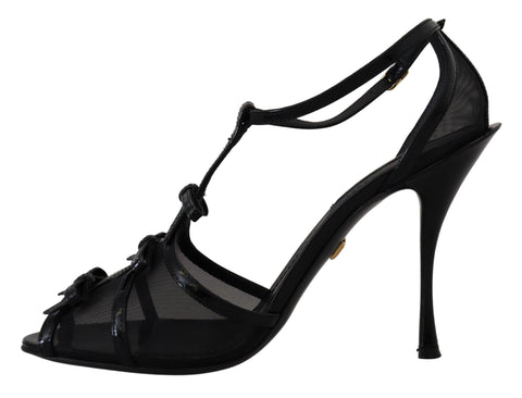 Black Dolce & Gabbana stiletto high heels sandals with sleek straps and pointed toes, stylishly designed for elegant footwear.