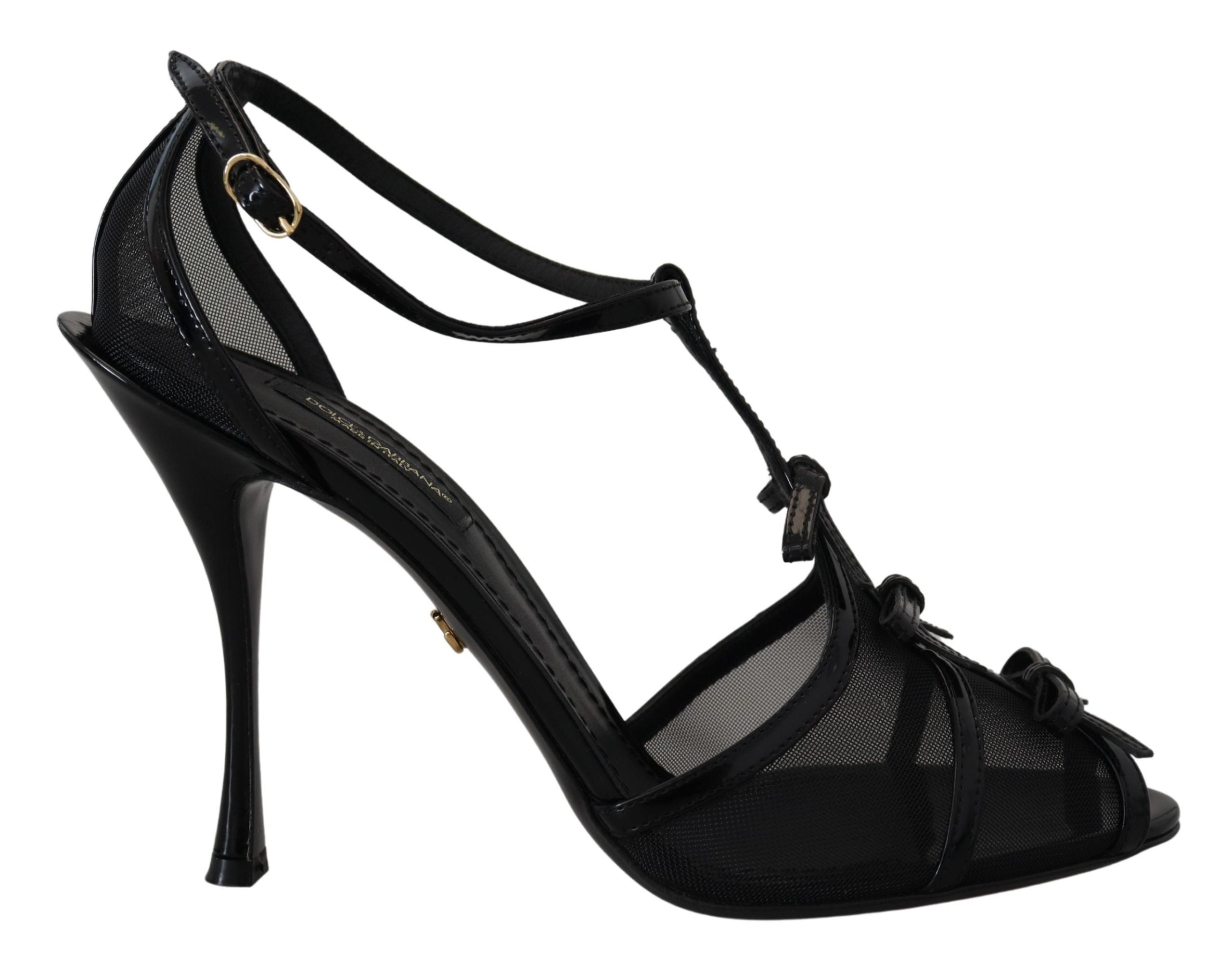 Black Dolce & Gabbana stiletto high heel sandals with ankle straps and open toe design.